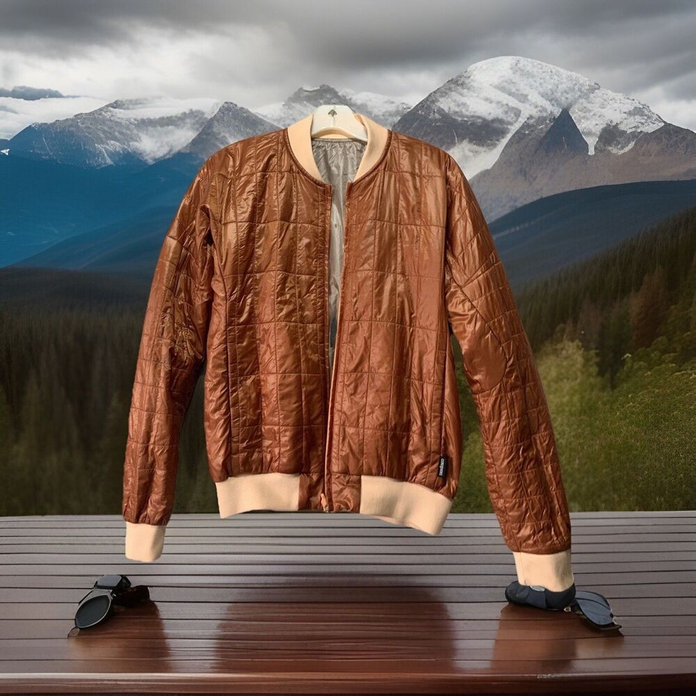 cotopaxi Copper Brown Quilted Bomber Jacket with Cream Trim